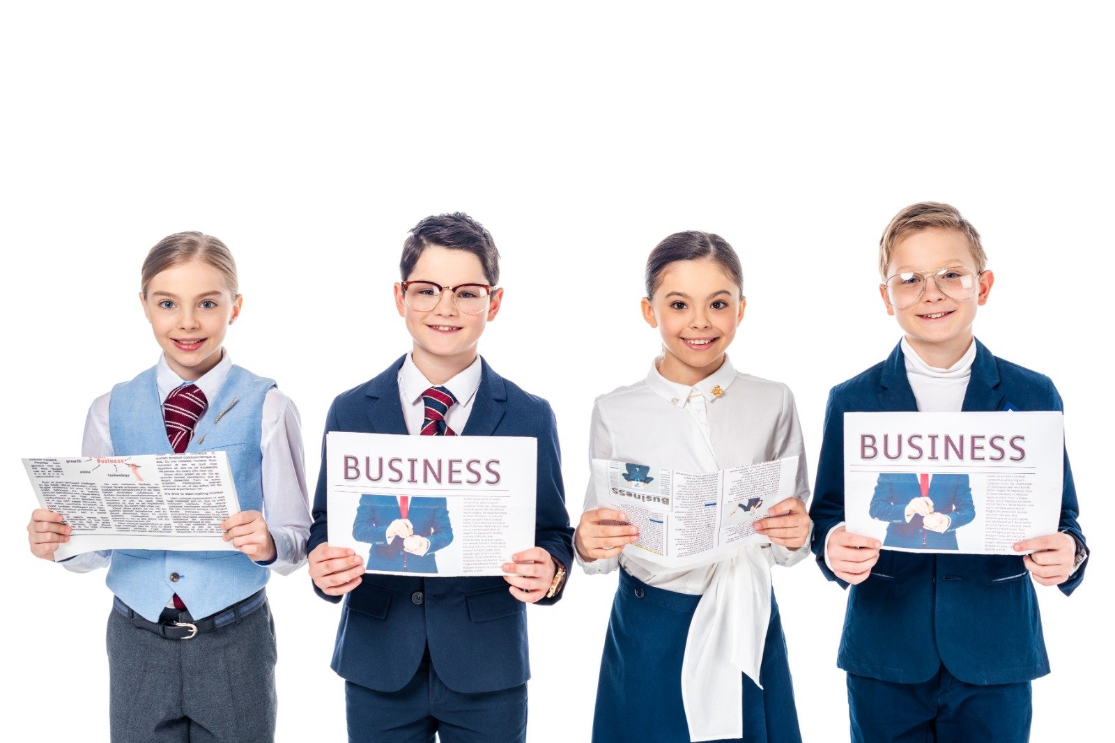 Four children dressed in business attire holding Mini CEOs™ certificates, celebrating leadership and achievement.